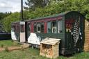 One of the railway carriages you can stay in at Amber's Bell Tent Camping at the Little Massingham Estate.