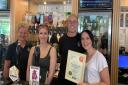 Michaela Bollard, bar manager, Tiffany Long, head chef, and Jonathan and Naomi Pearson (L-R) from The White Hart Ashill with their CAMRA award.