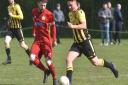 Action from the game between Hellesdon and Caister Picture: Sonya Duncan