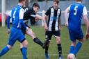 Luke Reed pulls the trigger through a barrage of players to put Swaffham Town 2-1 ahead on Saturday Picture: EDDIE DEANE