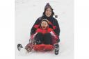 Rebecca Burt with her son Freddie Burt (6) on the slopes at Bawsey. Picture: Ian Burt