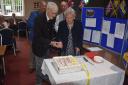 Dereham RBL member gathered at Toftwood Social Club to celebrate the 100th birthdays of Eric Swann and Olive Rawlings (front) behind them are Hugh King (left) and General Page