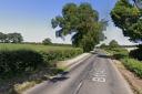 The B1145 at Litcham is closed due to a live power cable falling into the road