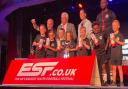 Players and coaches from Hockering FC Boys under seven being presented by Kevin Keegan and England women's legend Rachel Unitt with their trophies after winning ESF Festival of Football in their age division