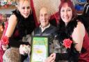 John Lister was sent a card by Norwich City to mark his 101st birthday, pictured here with Thorp House care home activities coordinators Marcia Hughes, right, and Sharon Westwood Picture: Kingsley Healthcare