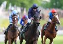 Amelia Earhart (centre) in action at Chester (Martin Rickett/PA)