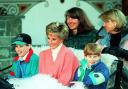 The Princess of Wales and her two sons, Princess William and Prince Harry in Austria in 1994 (Martin Keene/PA)