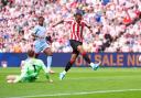 Sunderland’s Wilson Isidor scores their side’s first goal against Fulham (Owen Humphreys/PA)