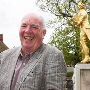 Roy Brame, town and district councillor at the Thomas Paine statue in Thetford