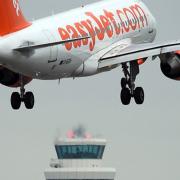 An easyJet plane landing at Gatwick Airport in West Sussex. Picture: Gareth Fuller/PA Wire
