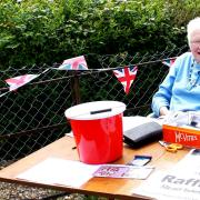 Olive Norris, from Thompson, will be putting up bunting and flags at the Post Office branch in the village, which is run from her home.
