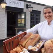 Jemima Wood with some of her bread, pastries and cakes at her business Dollies Bakery in Coltishall.