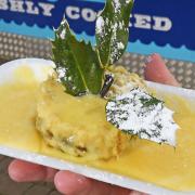Connie Hodges' battered Christmas pudding she sells on her fish & chip stall on Great Yarmouth Market.Picture: ANTONY KELLY