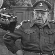 Captain Mainwaring played by Arthur Lowe captured while filming at Lynford Hall in south Norfolk in the early 1970s.