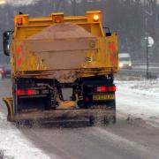 EADT NEWSA gritter on the  snow covered A11 at Barton Mills.PICS MICHAEL HALLES 4 03 05