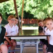 East Bergholt Primary School pupils have been learning outside under canvas, in two large tipis put up to create extra learning space and help social distance  Picture: CHARLOTTE BOND