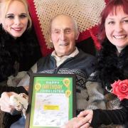 John Lister was sent a card by Norwich City to mark his 101st birthday, pictured here with Thorp House care home activities coordinators Marcia Hughes, right, and Sharon Westwood Picture: Kingsley Healthcare