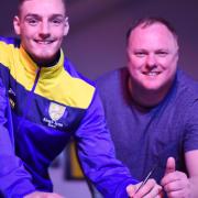 Matty Castellan, pictured here with manager (R) Gary Setchell, has signed an 18-month contract at King's Lynn Town. Picture: Ian Burt