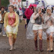 Festivalgoers at Reading were caught in Saturday’s downpours (Jeff Moore/PA)