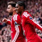 Marcus Rashford celebrates with Bruno Fernandes (David Davies/PA)